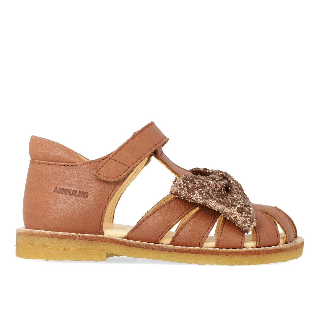 Sandal mit Glitzerschleife und Klettverschluss
